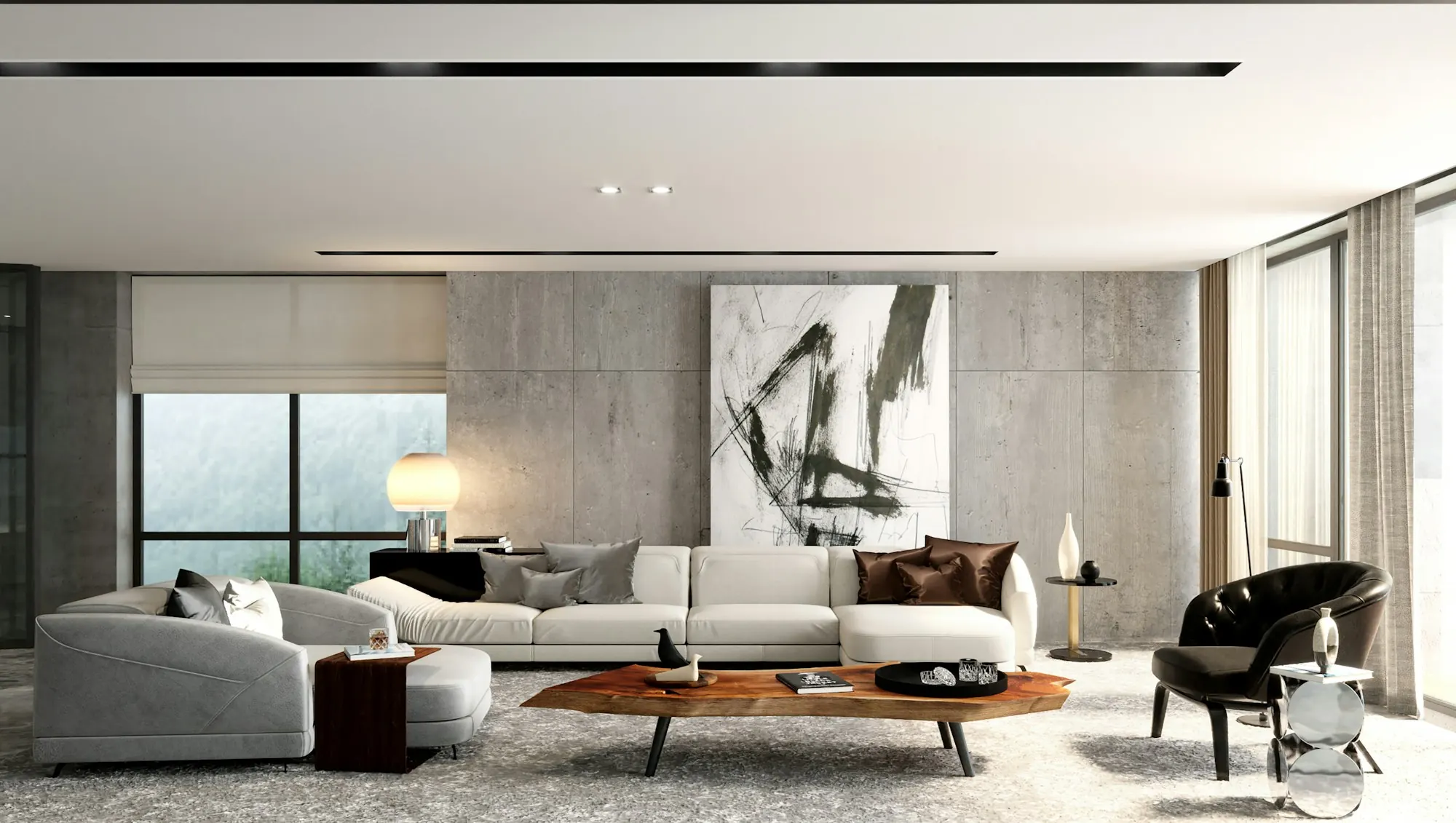 A bright modern living room with a curved sofa and large artwork